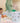 Children's party mermaid catering with seashell-themed serving dishes, straws and party favours