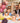 Toddler's 1st birthday party, family at the table with teddy bear decorations, balloons and cake