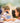 Space themed party with blue balloons, rocket decorations and space party supplies