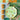 Children's safari-themed tableware set; mugs, plates, and napkins in beautiful shades of orange and light green with animal patterns